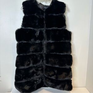 Elisa’s faux fur vest
